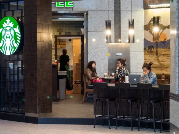 Starbucks, Macbook, young people.