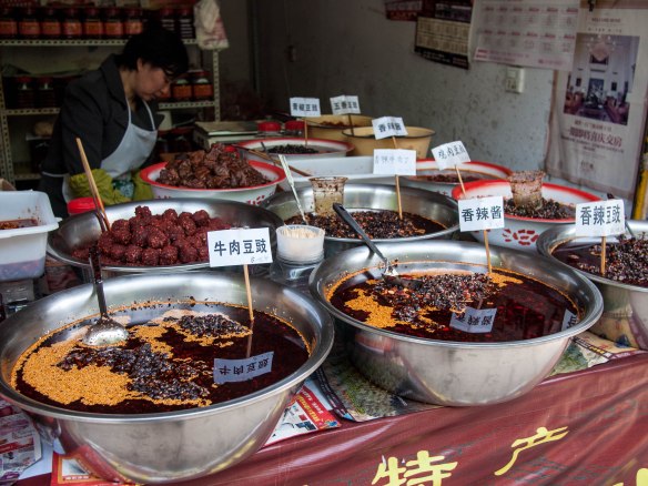 Vendor selling fermented and seasoned soy beans.