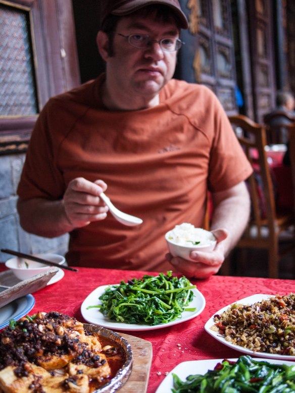 My research companion deep in his work.